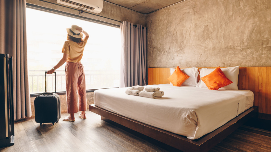 Woman in hotel room